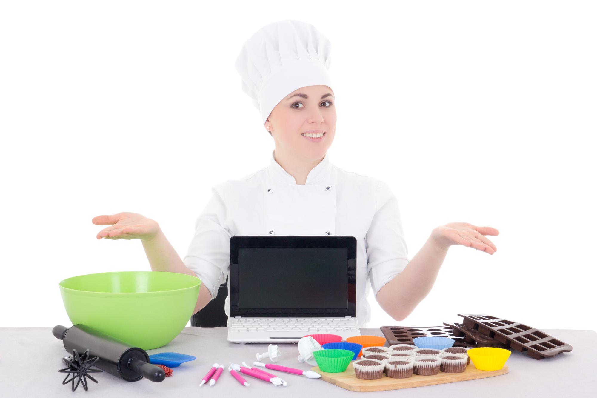Chef teaching online with ingredients on table